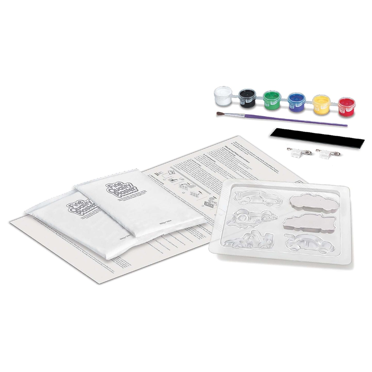 Art supply kit with paint, brushes, and bags of plaster on a white background