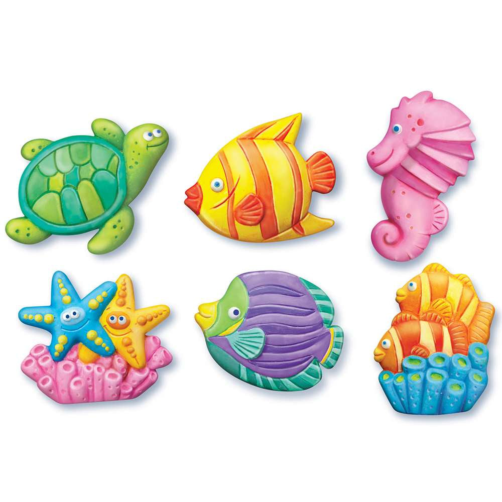 Set of colorful sea-themed plaster creations including a turtle, fish, seahorse, starfish, and others on a white background.