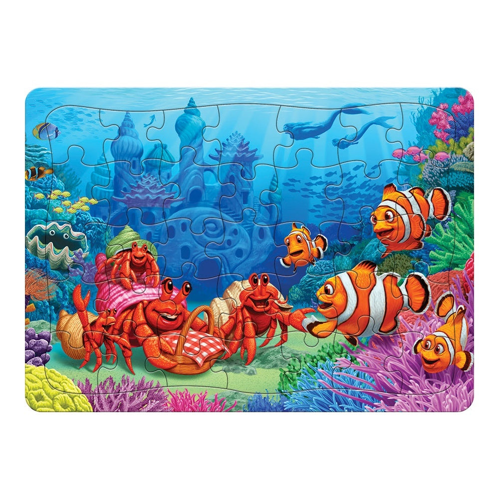35 piece cobble hill tray jigsaw puzzle depicting an underwater scene with clownfish and hermit crabs