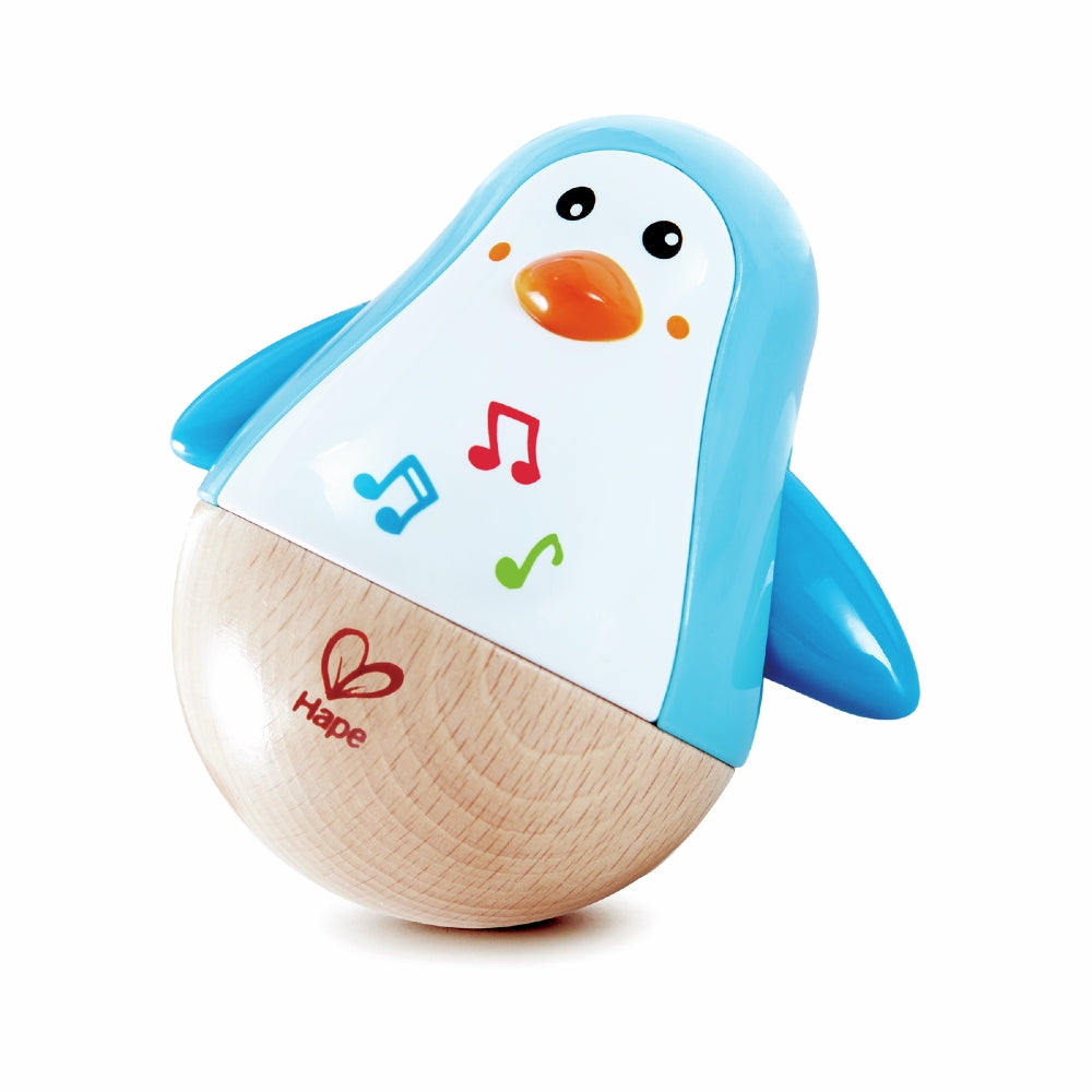 Blue and white Wobbly Musical Penguin form Hape toys on a white background