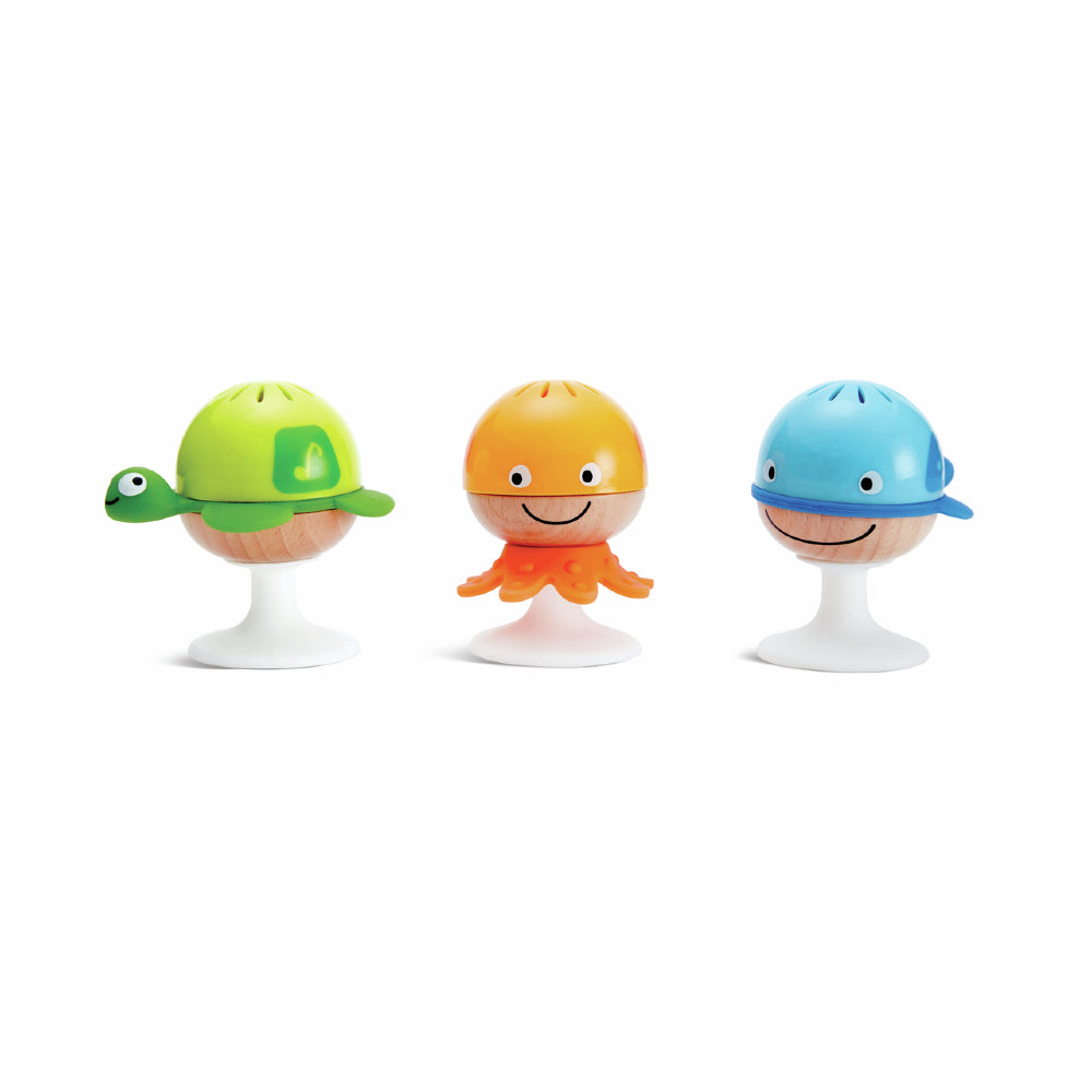 A set of three ocean themed baby rattles with suction cups on the bottom. Includes a whale, a turtle and an octopus