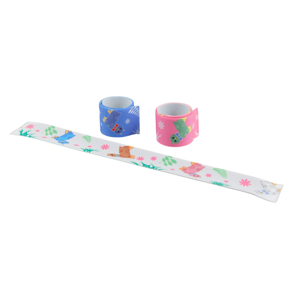 Three 'snap' bracelets, one pink, one white and one blue, with a llama design and various other graphics.