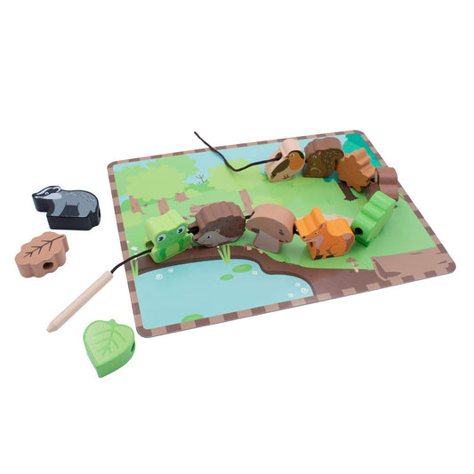 The Woodland themed lacing game from Jumini, with wooden figures including badger, hedgehog, fox, squirrel, bird, mushroom and leaves, all sitting on a scenery board and laced together with a thread
