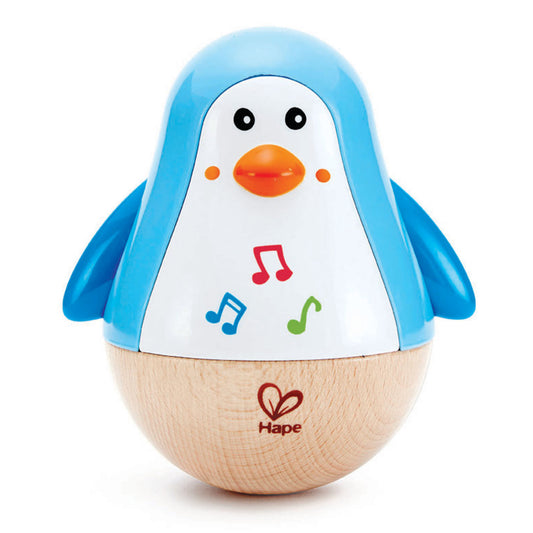 Blue and white Wobbly Musical Penguin form Hape toys on a white background