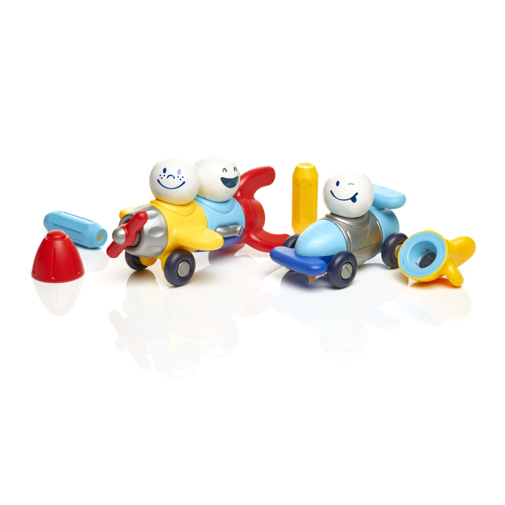 A mix of pieces from the SmartMax My First Explorers magnetic set, with parts for a race car, rocket and plane all mixed together